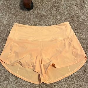 NWOT lululemon high rise orange shorts